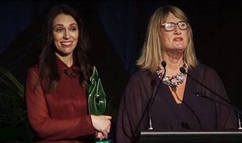 image of New Zealand PM giving awards
